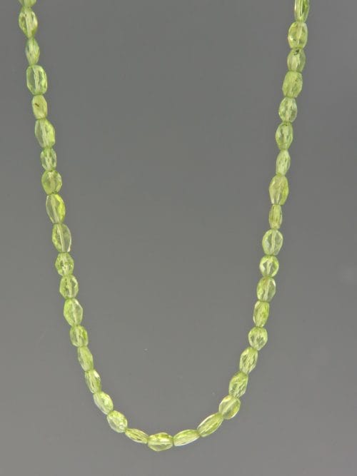 Peridot Necklace - faceted irregular oval stones - P012