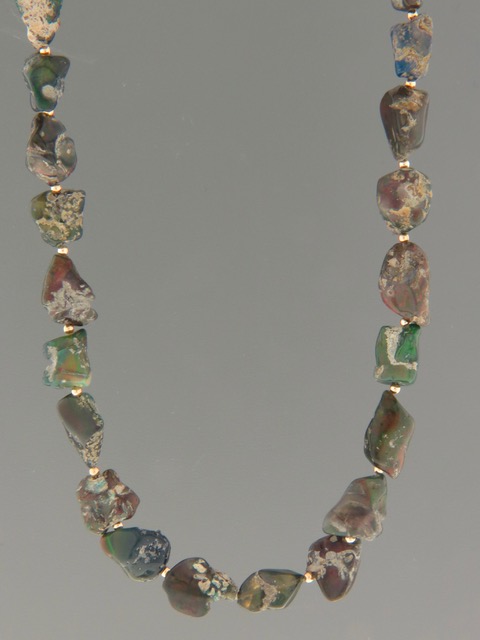 Ethiopian Welo Black Opal Necklace - irregular stones with Gold beads - OP009