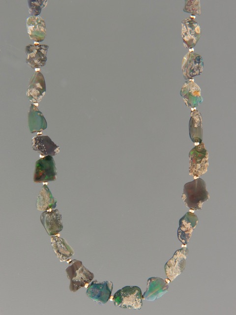 Ethiopian Welo Black Opal Necklace - irregular stones with Gold beads - OP011